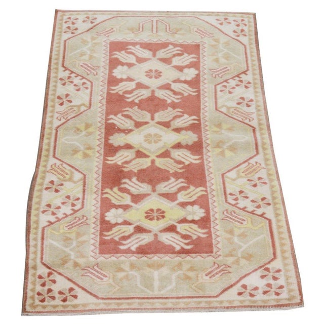 Hand-knotted with care using traditional rug-making techniques, this wool rug blends timeless craftsmanship with a modern...