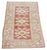 Hand-knotted with care using traditional rug-making techniques, this wool rug blends timeless craftsmanship with a modern...