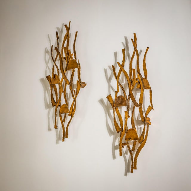Pair of wall lights in hammered metal designed by Salvino Marsura. Stamped Marsura on the reverse.