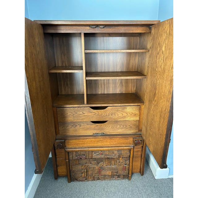 This brutalist armoire has been in my family for years as a set. It looks great with the other pieces but we have run out...