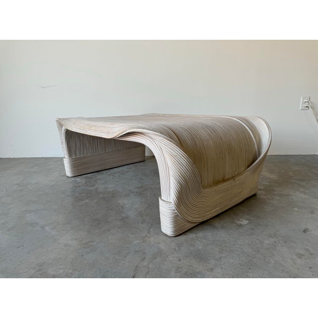 I'm pleased to offer for sale this magnificent Vintage organic Modern split reed "Sculptura" coffee table by the wickedly...