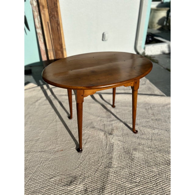 A beautiful antique table dating to the 1890s, retaining the character, warmth, and authentic patina that can only be...
