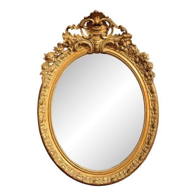 Circa 1860-80 French Grand Oval Carved Giltwood Mirror For Sale
