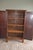 19th century English oak cupboard. The height is 176 cm. The width is 105 cm. The depth is 58 cm. Shelves behind the two...