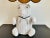 Adorable mid century hand made wicker teddy bear lamp in a matte white painted finish with googly eyes, ribbon necktie,...