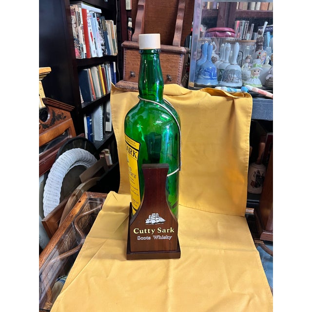 Vintage Mid-Century Modern Large Whisky Display Bottle in Wooden Cradle Stand For Sale In West Palm - Image 6 of 6