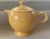 Vintage Fiesta yellow teapot with classic rounded body, pedestal base, ring handle, and fitted lid. Finished in one of...