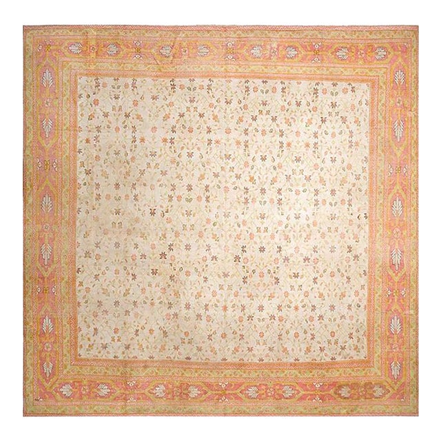 Pretty Yellow Color and Pink Border Doubled Palmettes Floral Design Antique Indian Agra Rug For Sale