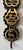 This leather strap was hung from horse saddles/harnesses during parades or other special events. Some of the medallions...