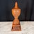 Large architectural wooden finial, finely turned with a classic urn-form silhouette, stepped socle base and original warm...