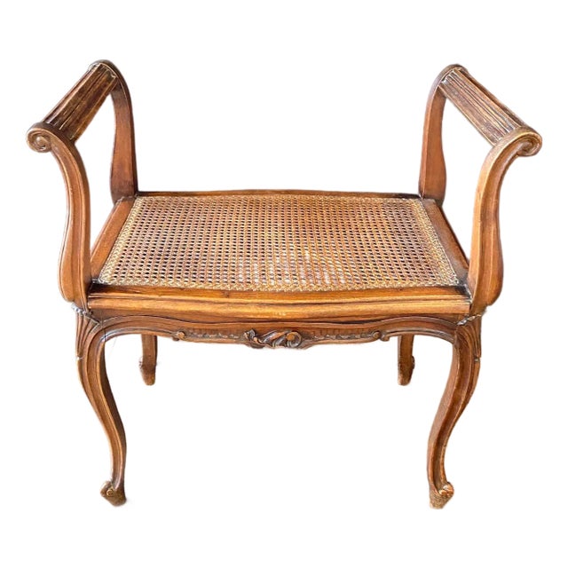 French Provincial Louis XV Carved Walnut Bench or Ottoman With Caning For Sale