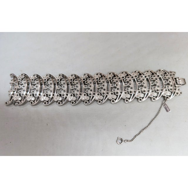 Vintage 1973 Signed Monet Rhodium Plated Openwork Link Primavera Bracelet For Sale In Philadelphia - Image 6 of 8
