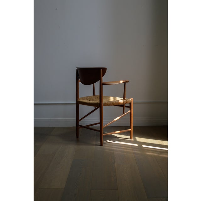 A beautifully crafted example of Danish modern design, this Model 317 armchair was designed by the celebrated duo Peter...