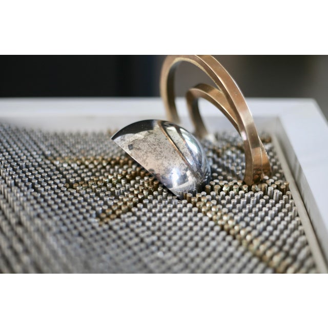 Sculpture from the 1980s, steel rods with aluminum support. Very heavy; some rods are missing from the sphere, some minor...