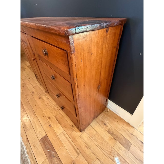 This beautiful Antique New England Pumpkin Pine Cupboard was originally in a local estate in New London, NH where it was...