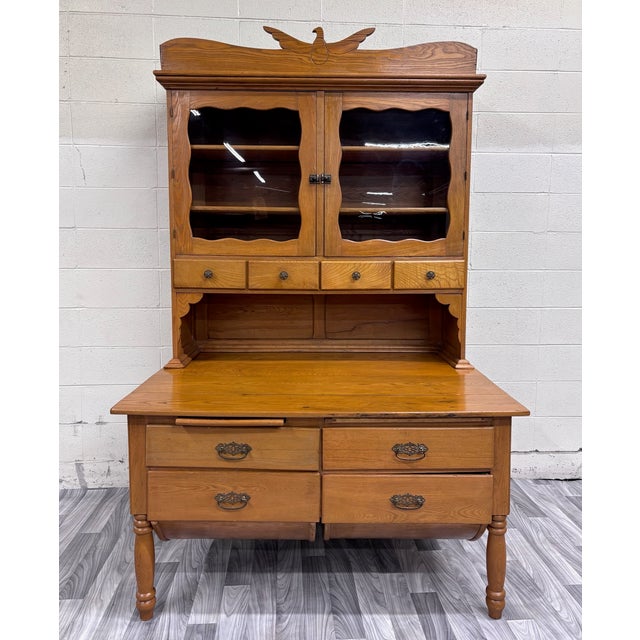 This is a gorgeous antique Victorian possum belly American baker’s cabinet, kitchen cupboard, likely circa 1890–1910,...