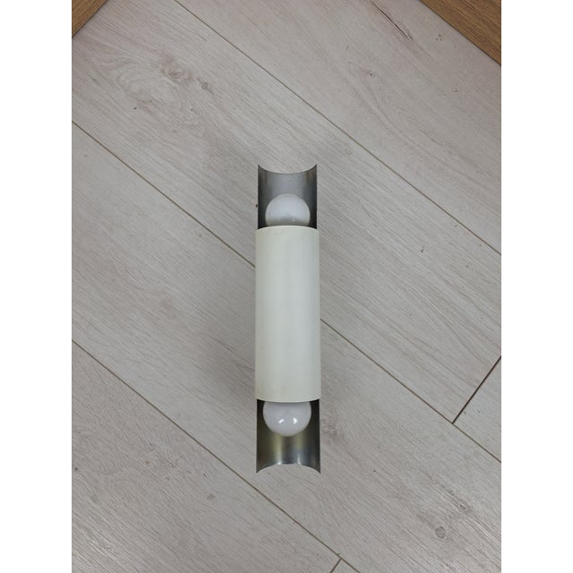 Tubetto Two-Light Wall Lamp in White Iron and Chrome by Stilnovo, 1960s, in Very Good conditions. Designed 1960 to 1969...