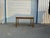 Vintage Danish Modern extendable dining table featuring classic Scandinavian styling, warm teak tones, clean lines, and a...