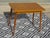 Vintage French-made folding table in oak and light oak veneer, manufactured by SAM in the 1950s. This table is from the...