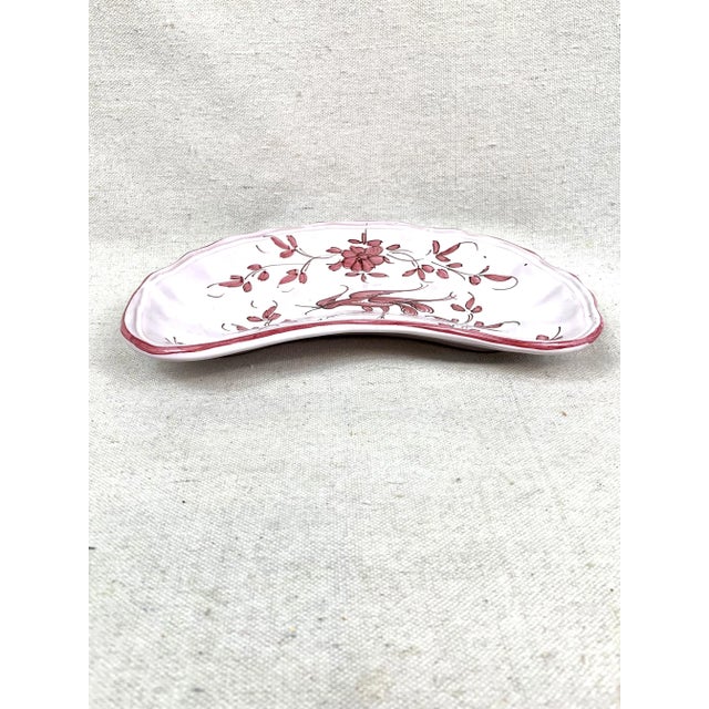 Vintage Italian catchall decorated with a wading bird. This kidney shaped plate could also be used to service nuts or...