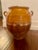 Authentic antique French confit pot dating to the late 19th century. This classic piece features a rich golden carmel-...