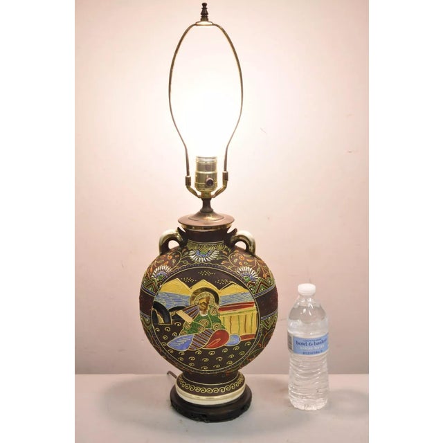 Vintage Oriental Japanese Figural Samurai Brown Ceramic Jug Form Table Lamp. Circa Mid 20th Century. Measurements: 25" H...