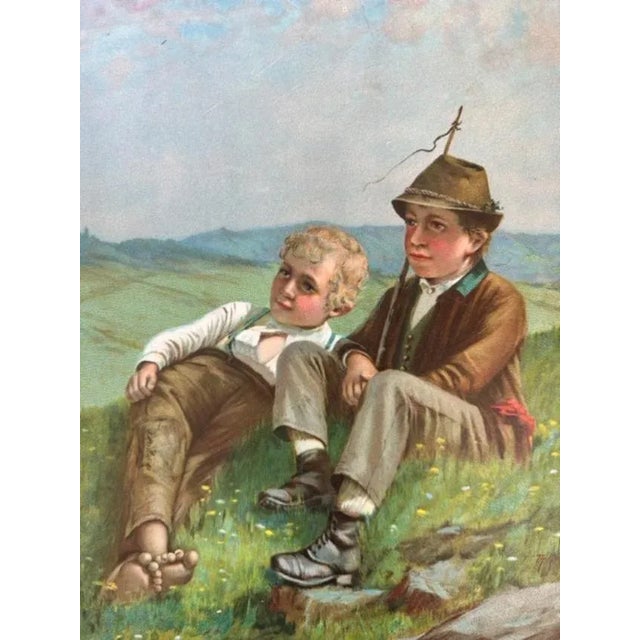 A late 19th century tin cocoa advertising sign with an Alpine scene — German advertising art. Measures 20.5"W x 30"H, with...