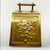 This antique brass coal scuttle brings instant warmth and character to the hearth. Likely English, Victorian–Edwardian era...