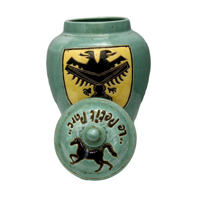 Stoneware urn commemorating World War II hero pilot, Rene Mouchotte. He has streets and parks named after him in Paris....