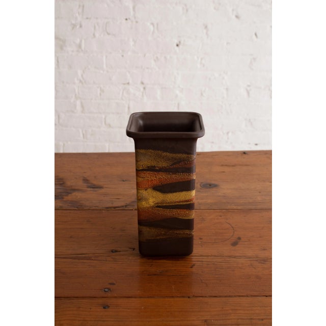 Royal Haeger geometric form vase from the "Earth Wrap" series. Brown base coat with abstract textured yellow and orange...