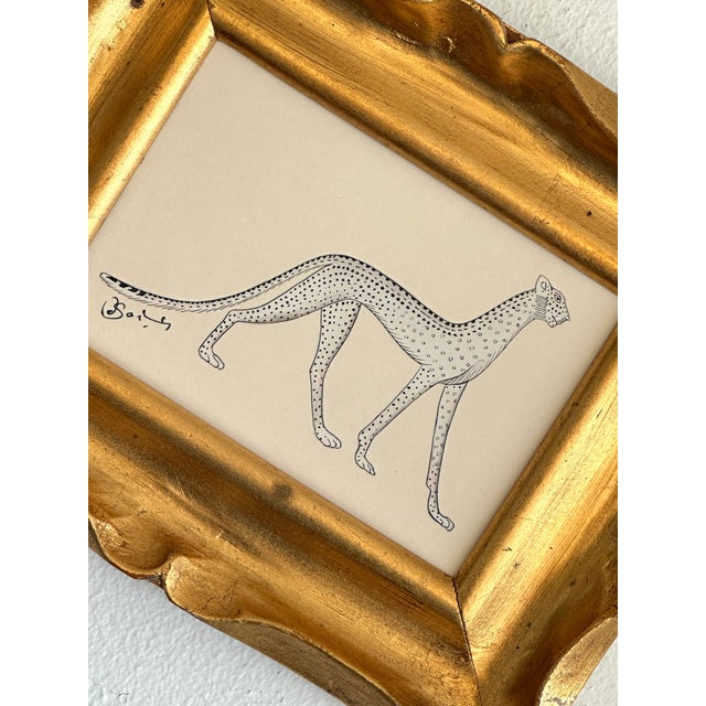 A handpainted folk cheetah brought to life with extraordinary precision by our master artist. Rendered in classic black...