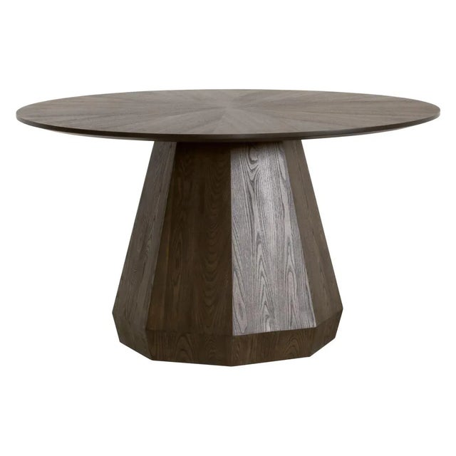 Coulter 54" Round Dining Table The Coulter 54" Round Dining Table by Essentials For Living will make a strong visual...
