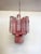 Italian vintage glass chandelier with albaster pingk glass tubes. The armor polished nickel supports 36 large glass tubes...