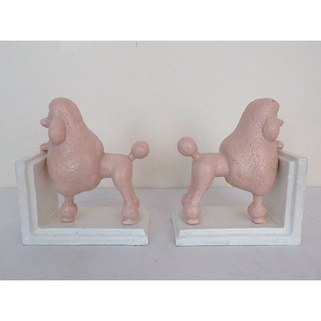 FREE SHIPPING ANYWHERE IN THE CONTINENTAL US! This is a set of whimsical vintage bookends featuring pink French poodles...