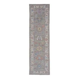 Hand-Knotted Afghan Oushak Runner on Light Gray Field and Colorful Motifs For Sale