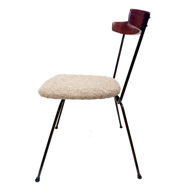 Sculptural mid-century modern accent chair, by iconic designer Clifford Pascoe, featuring a sculpted wood backrest,...
