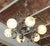 Space Age Polished Chromium with Six Murano-Opaline Glass Globes Chandelier by Mazzega, 1970s For Sale - Image 4 of 5