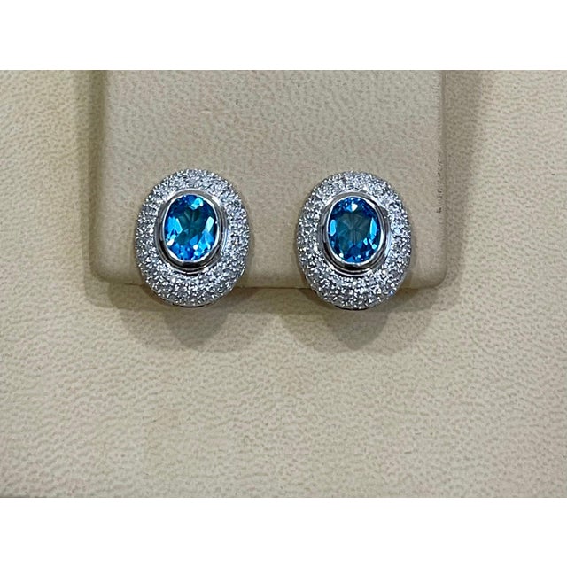 5 Carat Oval Shape Blue Topaz and Diamond Omega Back Clip Earring 14 Karat Gold For Sale - Image 4 of 18