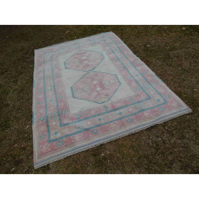 This is a vintage handwoven wool rug from Turkey. The piece was made in the 1970s. Excellent condition. Works well with...