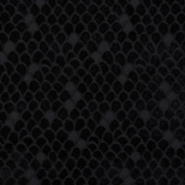 Named after Esther Williams, this elegant fish scale design makes a subtle splash. Tonal variations and shimmery filament...