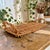 Elevate your dining experience with this Woven Bread Serving Tray with Handles, expertly crafted from durable wicker for...