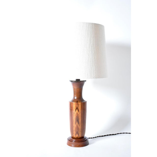 Wooden marquetry table lamp, 1960s. Wooden marquetry lamp drawing a geometrical pattern. Denmark, 1960s. Height (cm): 35...