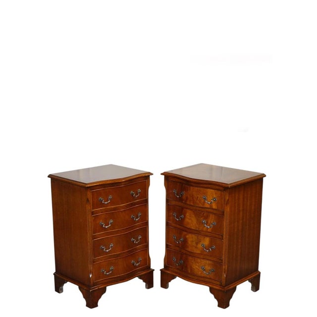 A beautiful pair of Georgian style serpentine nightstands / bedside tables, featuring elegant shaped fronts, classic...