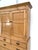 A 19th.century English Pine Linen Cabinet (Linen Press). A 2 part cabinet with a flared cornice top over a paneled top...