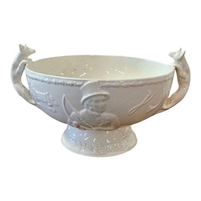 A Crown Devon pottery salad bowl and pair of servers moulded with "John Peel" and hunting scene, and with fox handles,...