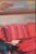 Interior Painting of a Blonde Girl on a Red Sofa by Donald Putt Putman (1926-2007) For Sale - Image 9 of 11