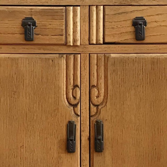A lovely art deco sideboard dating back to the 1920s. English made by c.w.s. Cabinet works (london) offering simple...