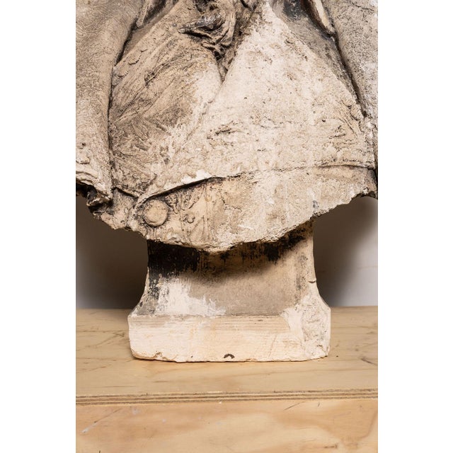 Discovered outside of Paris, France, this bust depicts a distinguished gentleman dressed in period military or civic...