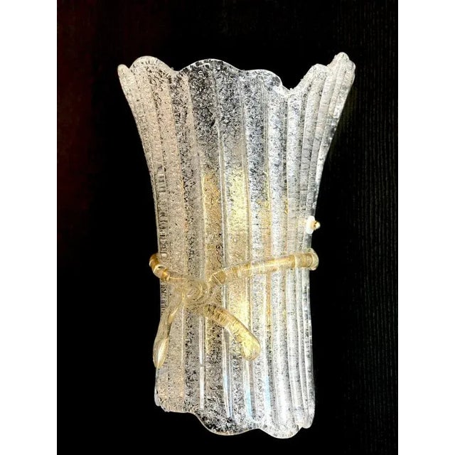 Pair of charming Murano glass sconces with brass fittings. Two E27 light bulbs. This piece is attributed to the mentioned...