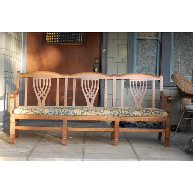 Purchased for our Craftsman bungalow in the early 2000s, this wooden bench with an upholstered cushioned seat has been a...